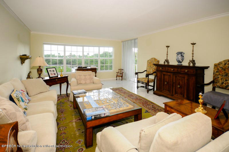 2195 Ibis Isle Road, Unit 6 Palm Beach, FL 33480 - Photo 2 of 15 a living room with furniture and a window