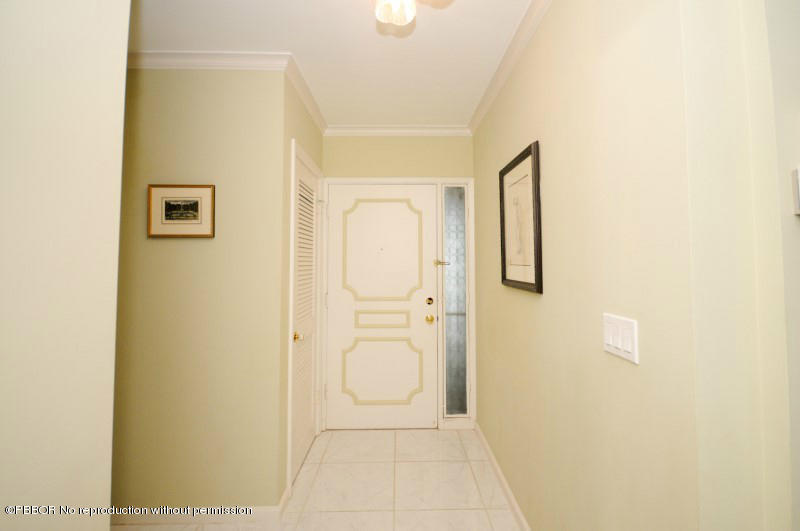 2195 Ibis Isle Road, Unit 6 Palm Beach, FL 33480 - Photo 11 of 15 a bathroom with a granite countertop shower and a sink