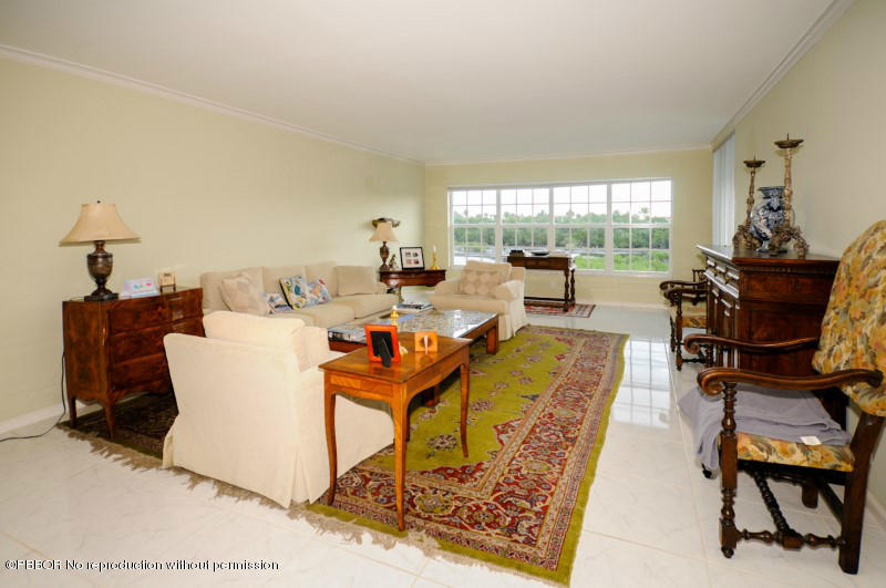 2195 Ibis Isle Road, Unit 6 Palm Beach, FL 33480 - Photo 3 of 15 a living room with furniture and a window