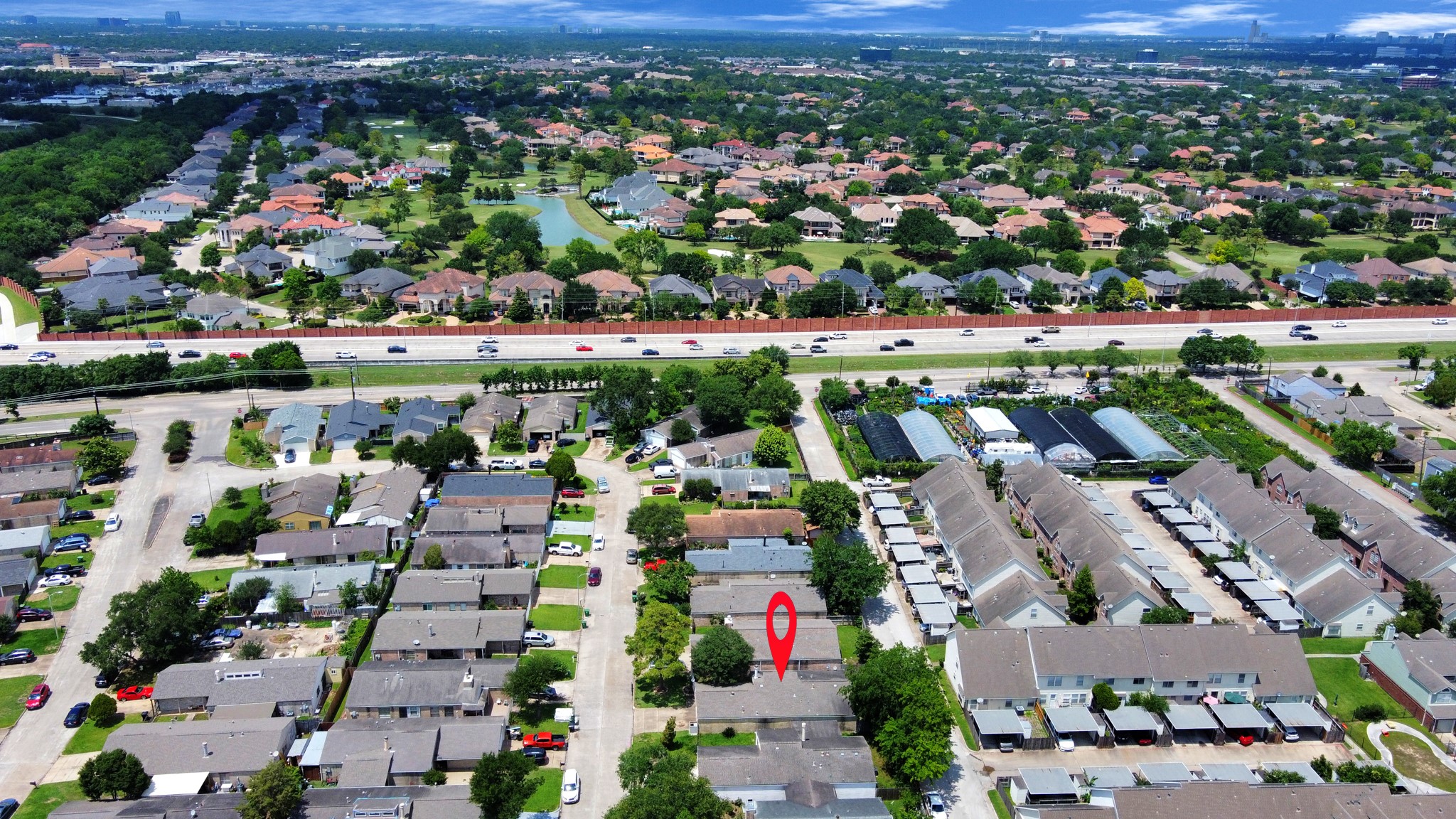 4155 Amir Street Houston, TX 77072 - Photo 3 of 43 an aerial view of a city