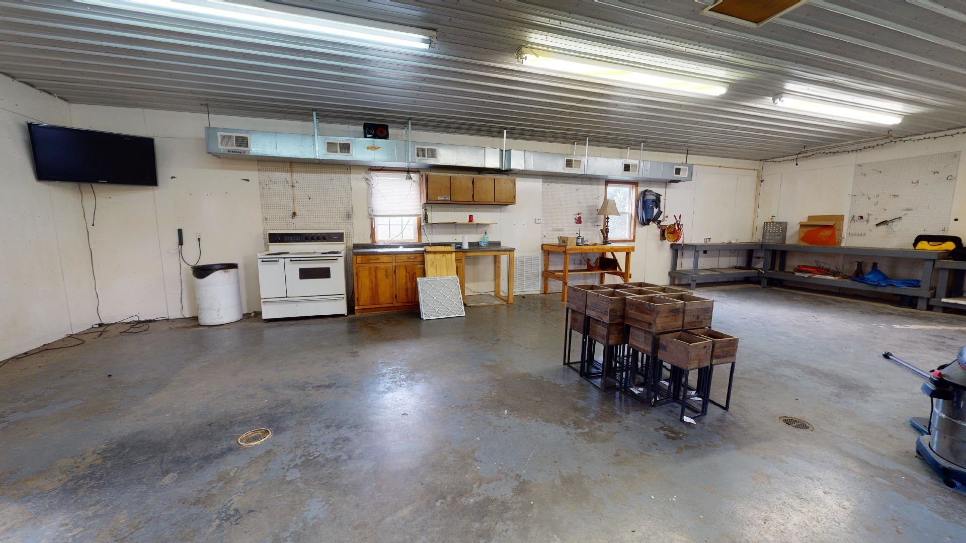 772 Cobb Road Newbern, TN 38059 - Photo 13 of 13 a living room with lots of furniture and clutter