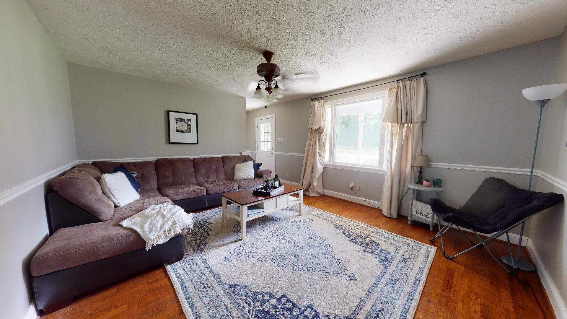 772 Cobb Road Newbern, TN 38059 - Photo 4 of 13 a living room with furniture and a rug