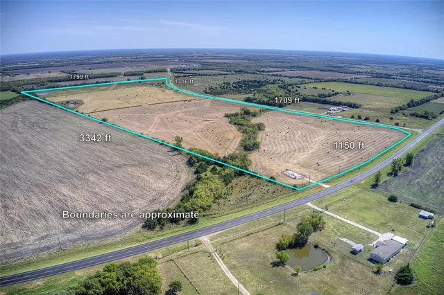 a view of a backyard with a ocean view