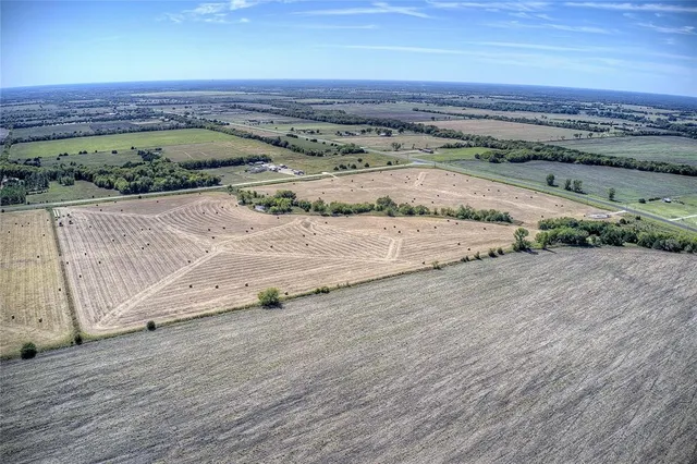 an aerial view of a large parking space