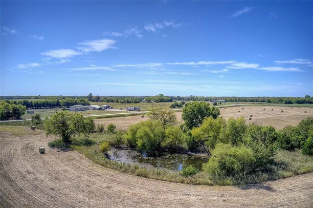 a view of a lake with a city
