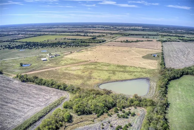 a view of an ocean and a mountain