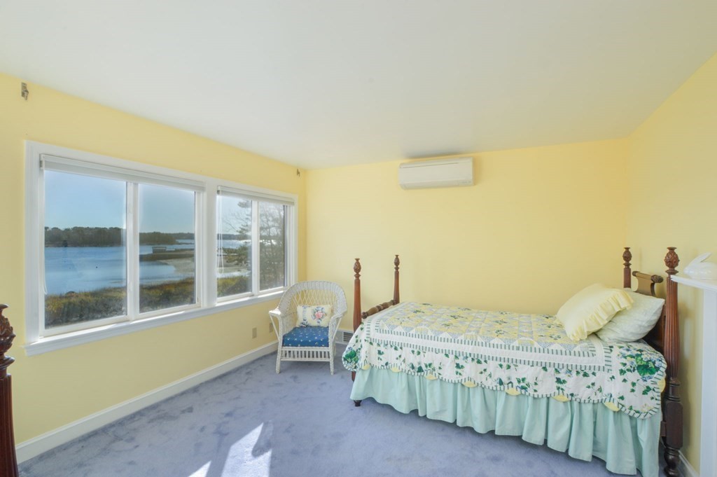 95 S Road Bourne, MA 02559 - Photo 17 of 33 a bedroom with a bed and a window