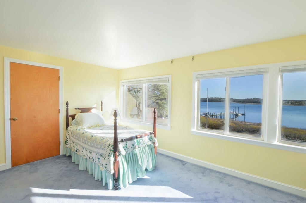 95 S Road Bourne, MA 02559 - Photo 19 of 33 a dining room with furniture and a window