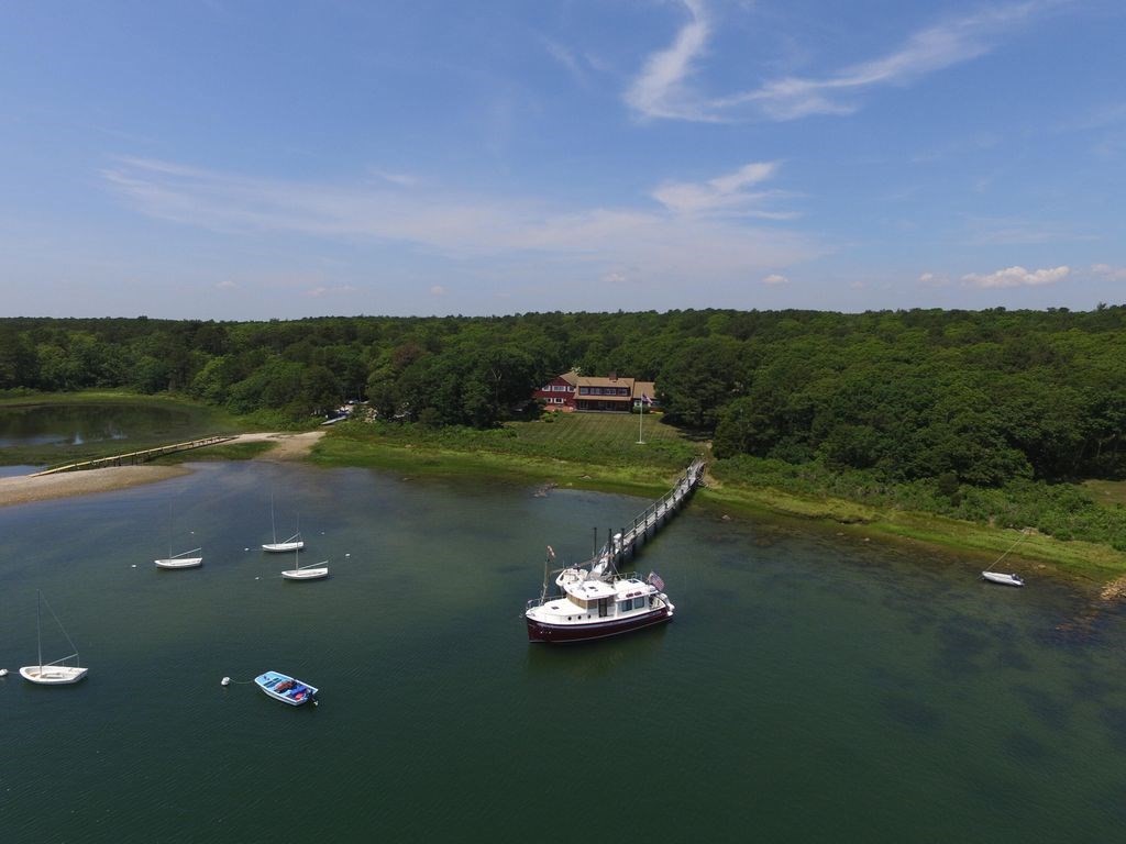 95 S Road Bourne, MA 02559 - Photo 2 of 33 a view of a lake with a big yard