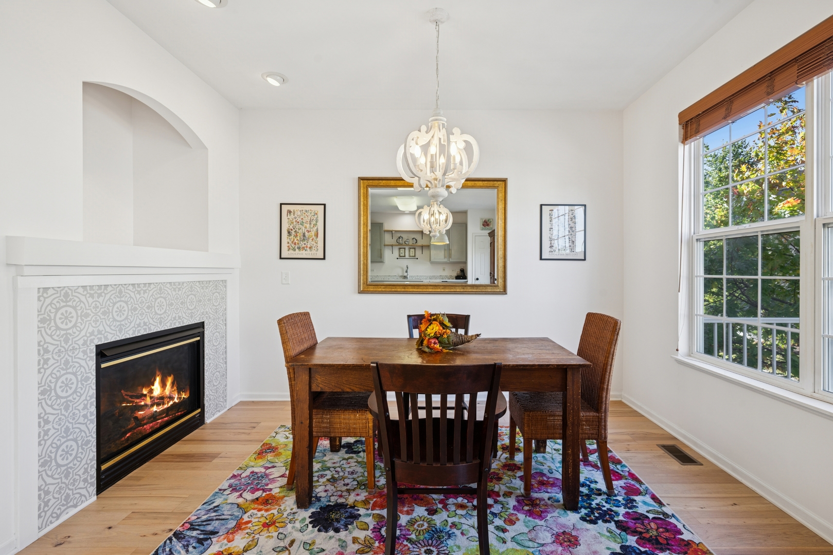 152 Jackson Street Gilberts, IL 60136 - Photo 12 of 31 a view of a dining room with furniture a chandelier and wooden floor