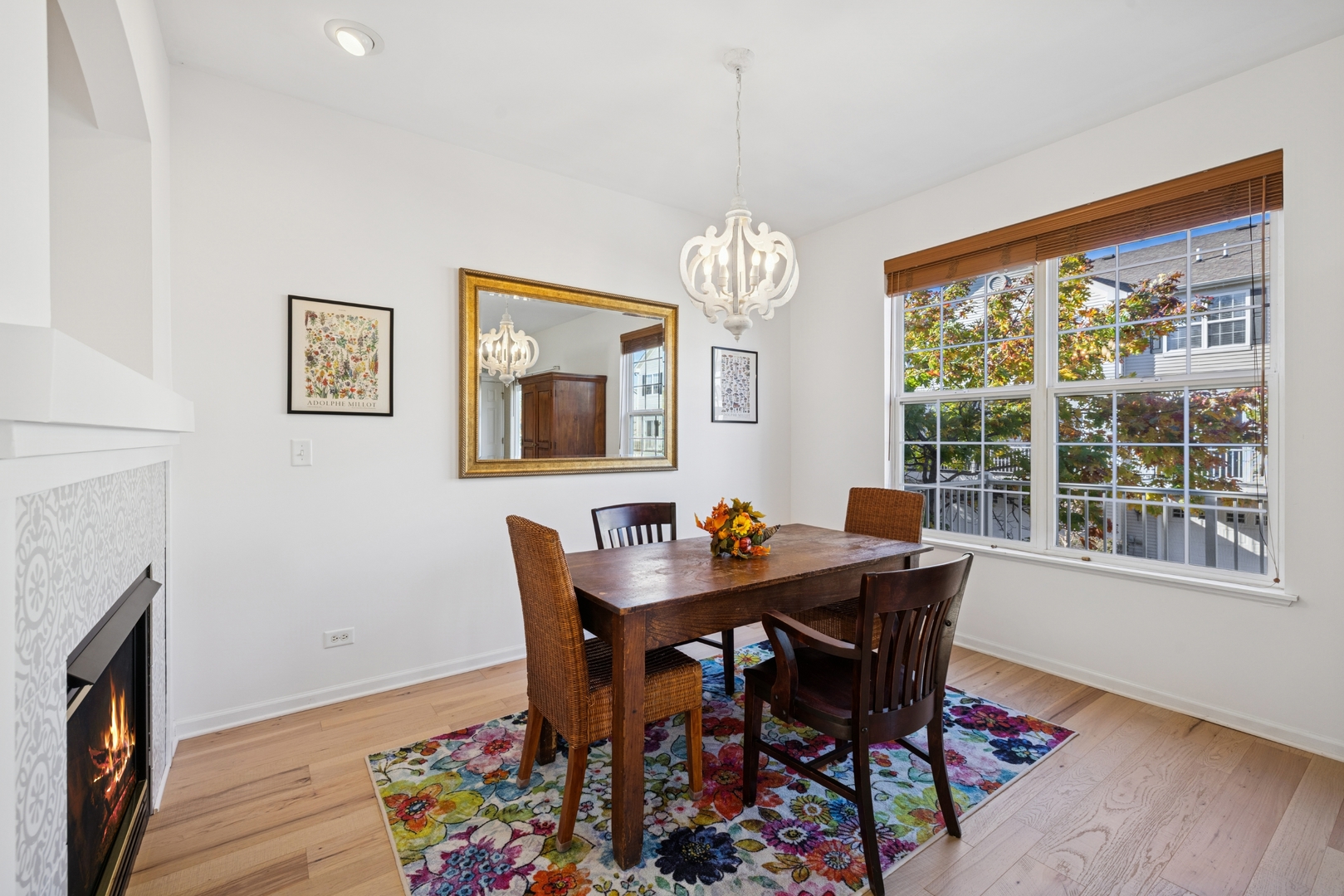 152 Jackson Street Gilberts, IL 60136 - Photo 13 of 31 a view of a dining room with furniture wooden floor and chandelier