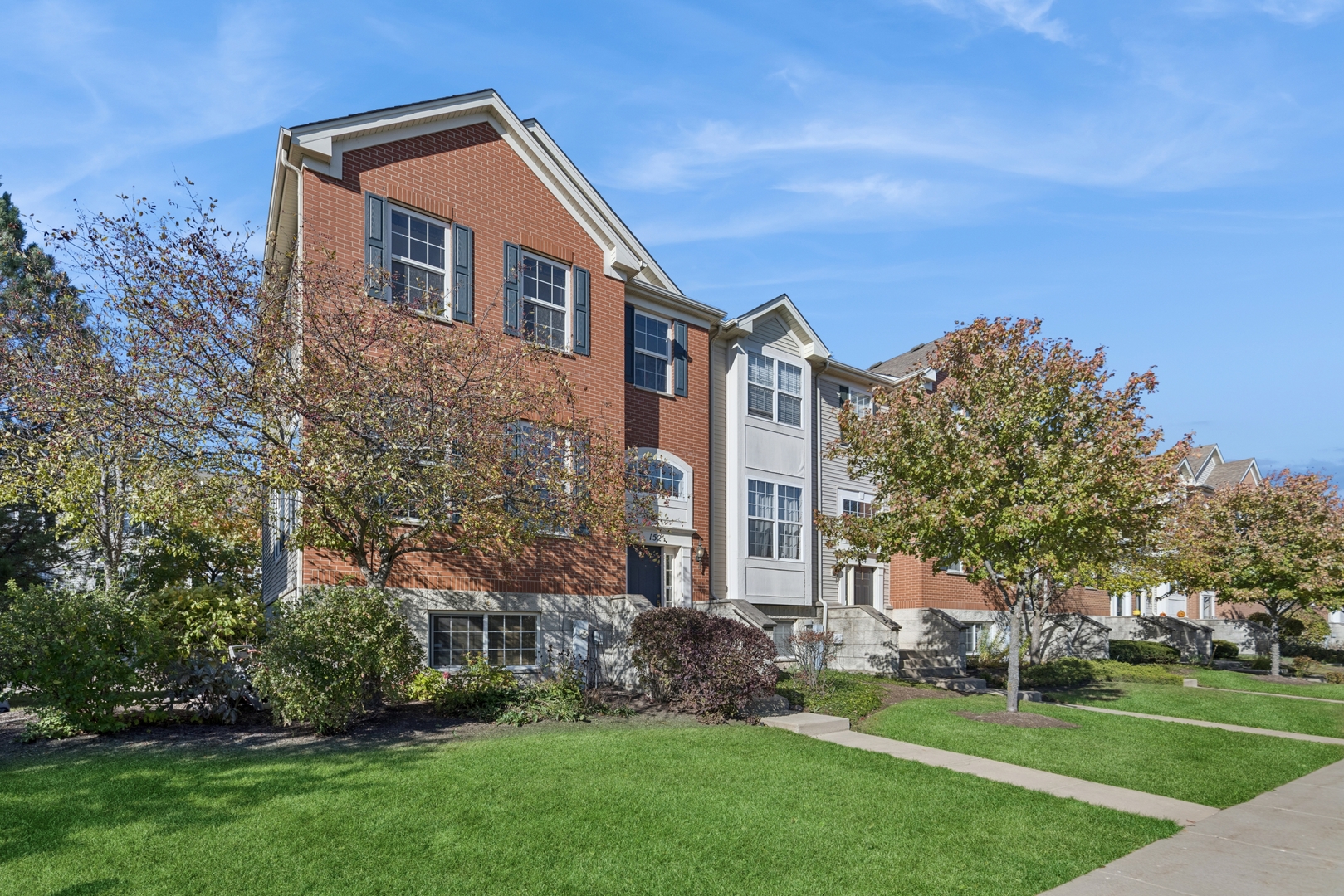 152 Jackson Street Gilberts, IL 60136 - Photo 2 of 31 a front view of a house with a yard