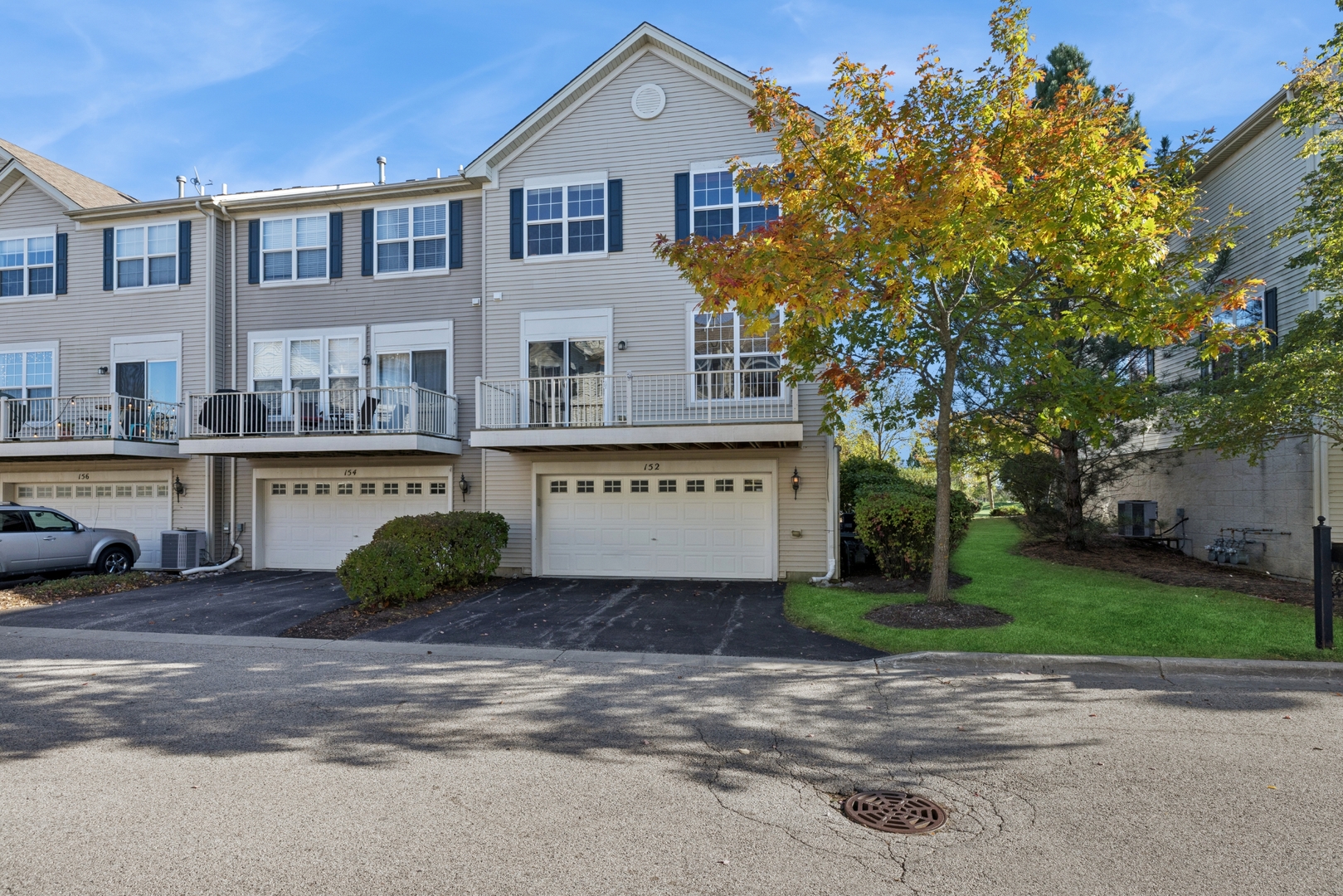 152 Jackson Street Gilberts, IL 60136 - Photo 24 of 31 a front view of a house with a garden and tree