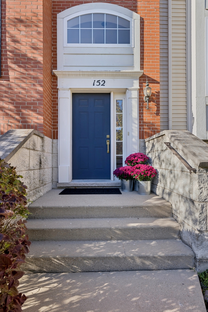 152 Jackson Street Gilberts, IL 60136 - Photo 3 of 31 a front view of a house with a yard