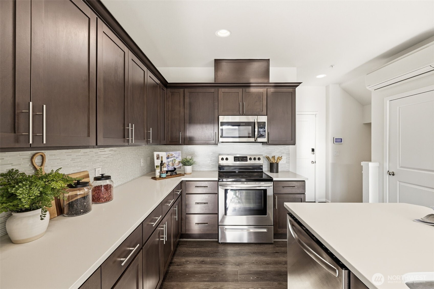 13125 83rd Lane South Seattle, WA 98178 - Photo 11 of 32 a kitchen with a sink a stove and cabinets