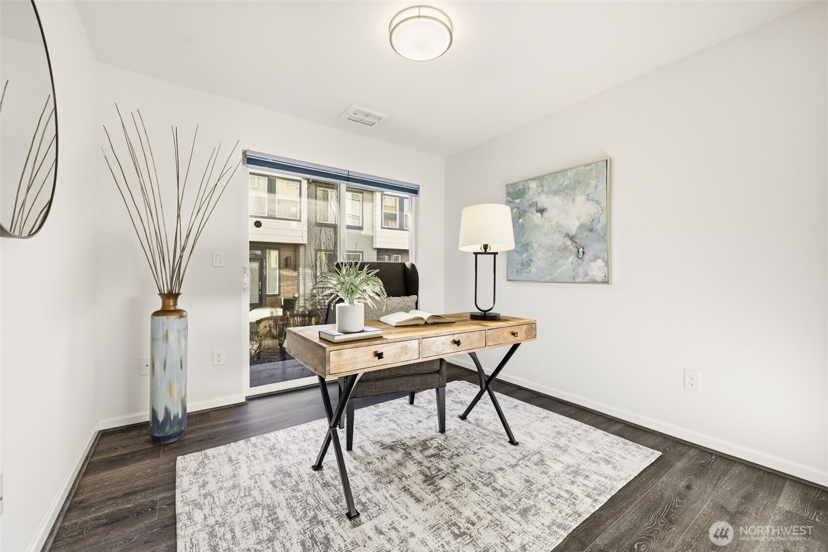 13125 83rd Lane South Seattle, WA 98178 - Photo 13 of 32 a workspace with furniture and a window