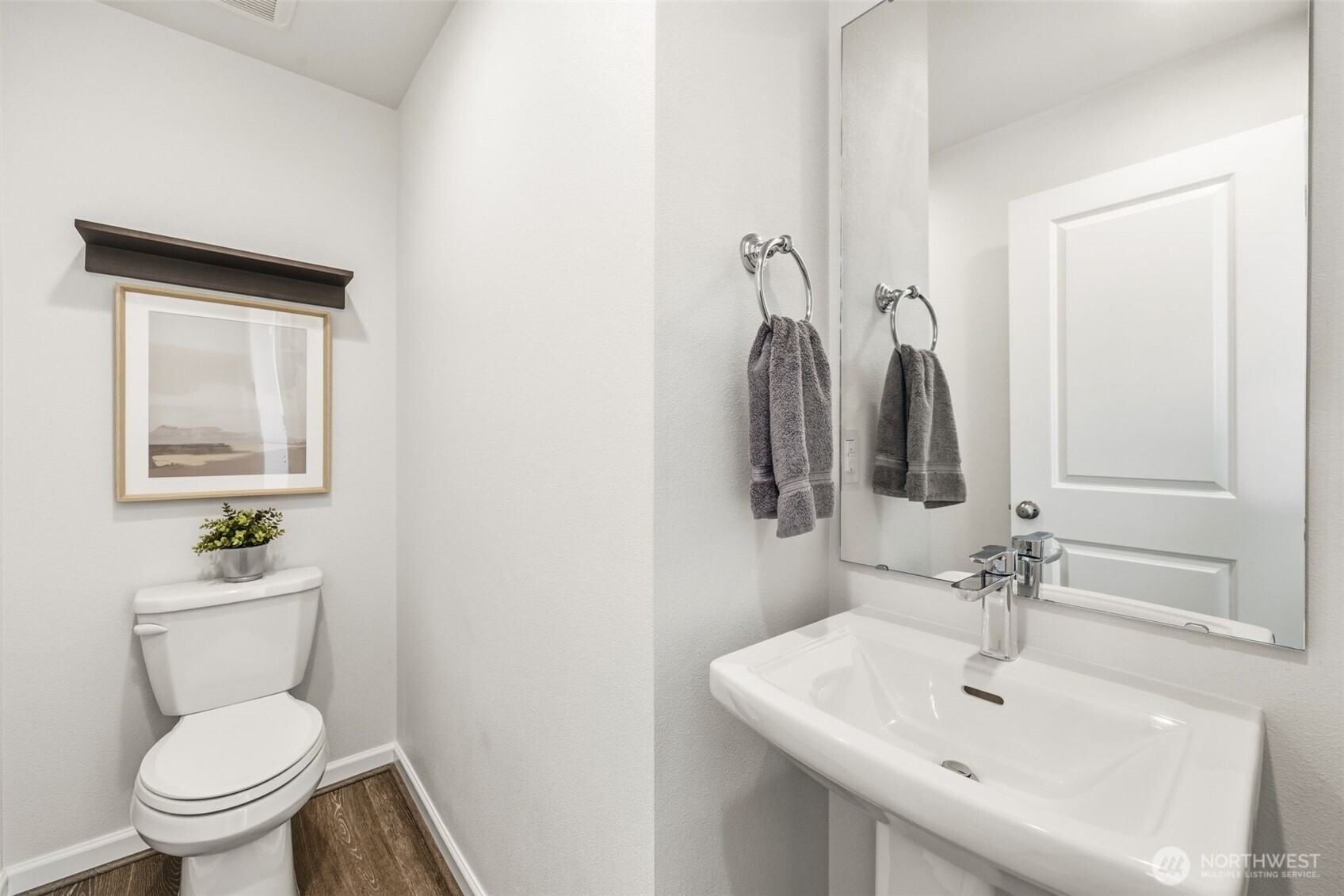 13125 83rd Lane South Seattle, WA 98178 - Photo 14 of 32 a bathroom with a toilet sink and mirror
