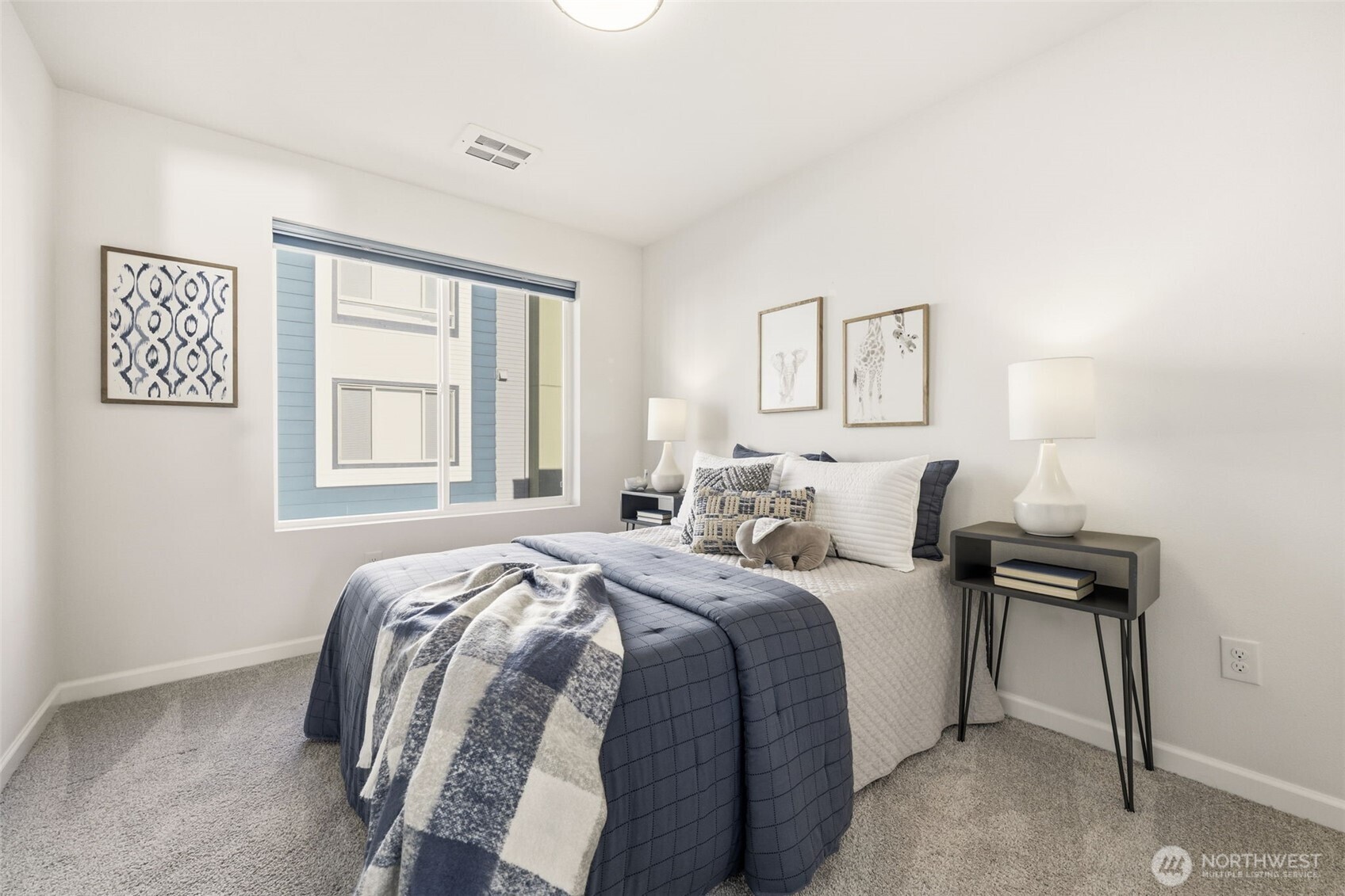 13125 83rd Lane South Seattle, WA 98178 - Photo 20 of 32 a bedroom with a bed and a window