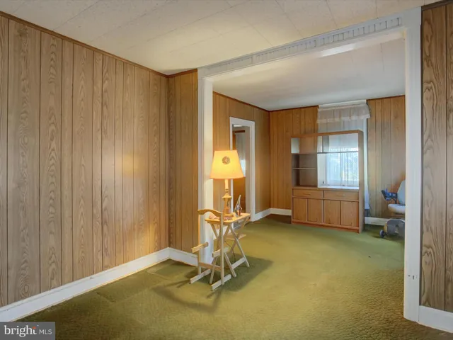 a room with furniture and a window