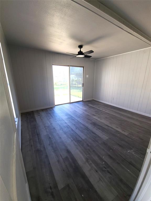 519 Dearborn Street Waco, TX 76704 - Photo 16 of 24 wooden floor in an empty room with a window