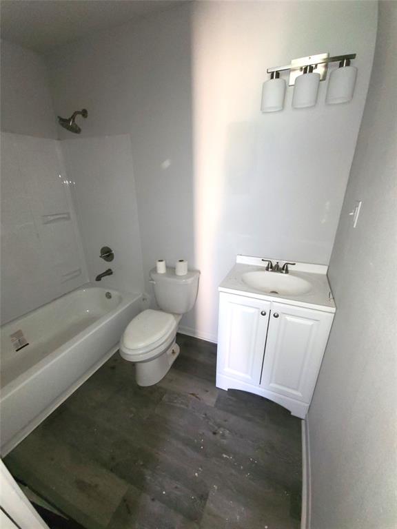 519 Dearborn Street Waco, TX 76704 - Photo 20 of 24 a bathroom with a sink a toilet and shower
