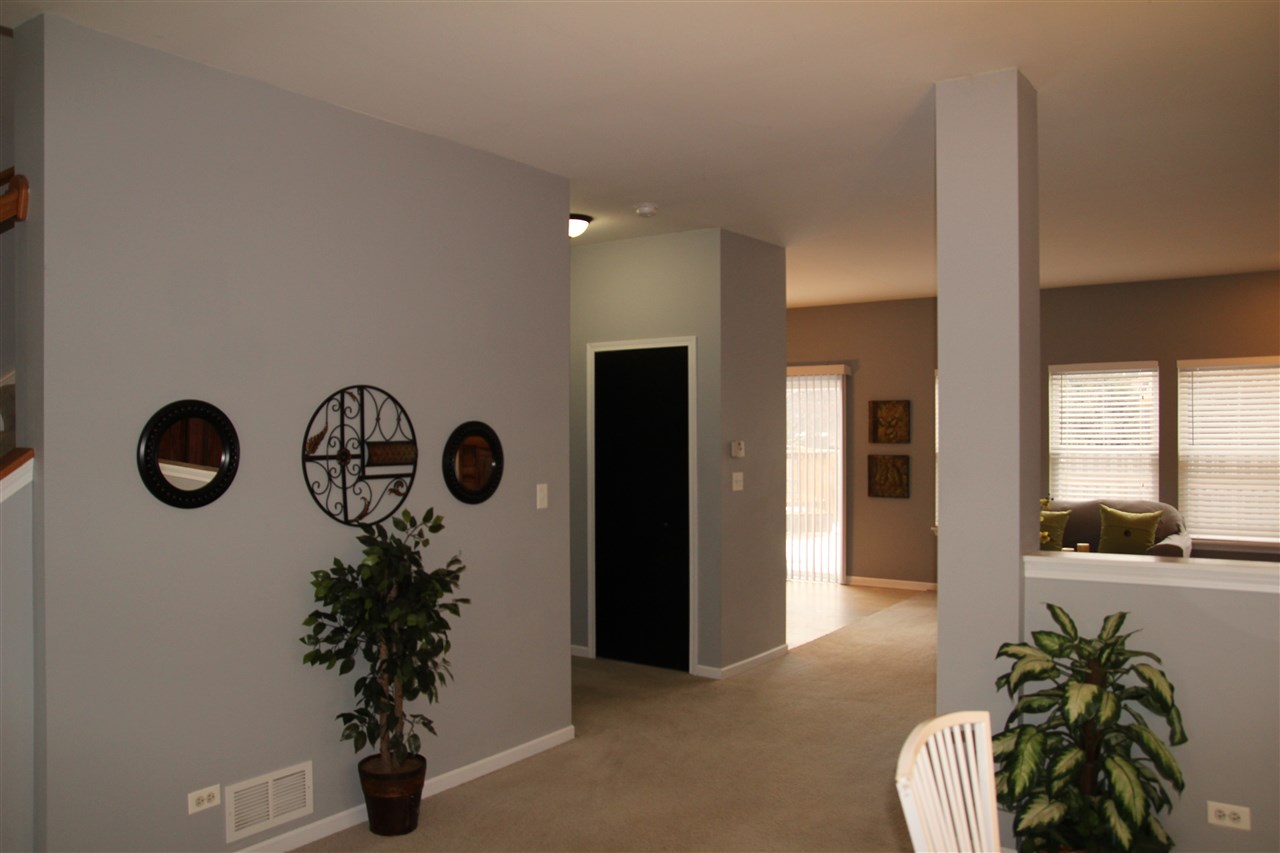 219 Ridgestone Trail Poplar Grove, IL 61065 - Photo 4 of 18 a view of entryway with wooden floor