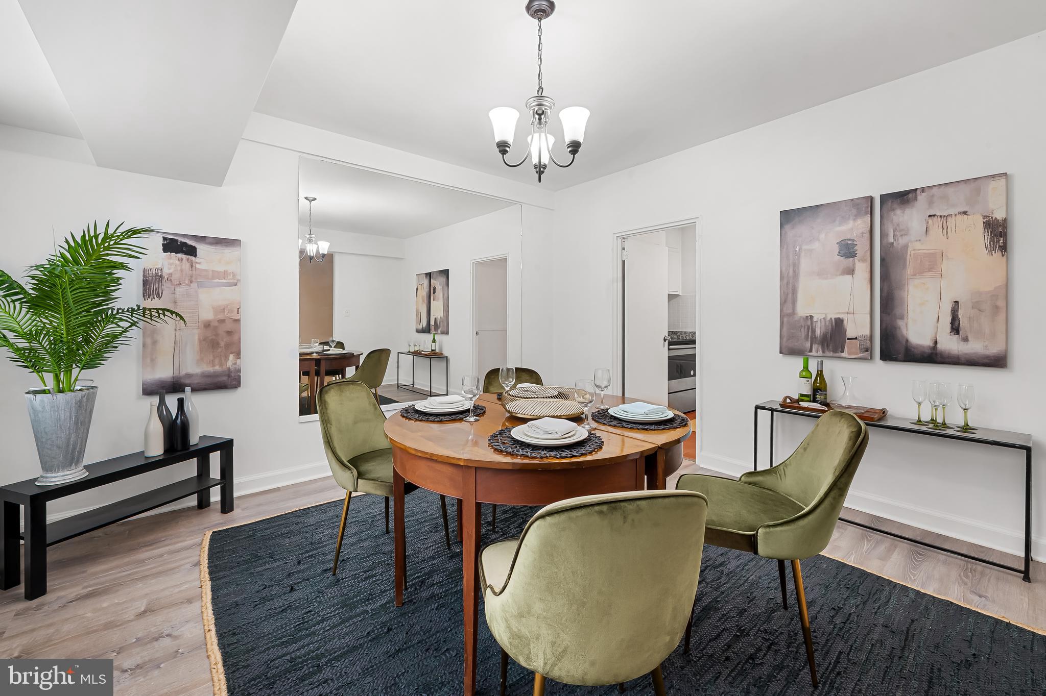 3601 Greenway, Unit 1 Baltimore, MD 21218 - Photo 11 of 29 a view of a dining room with furniture and wooden floor