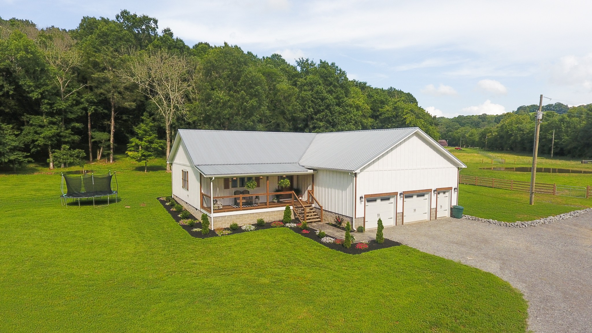 3 Blue Smith Road Petersburg, TN 37144 - Photo 4 of 37 a view of a house with backyard and a garden