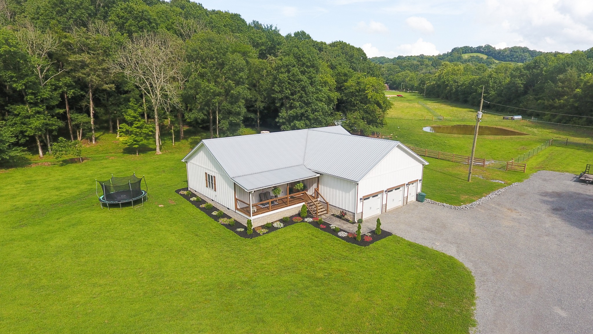 3 Blue Smith Road Petersburg, TN 37144 - Photo 5 of 37 a view of a house with pool and a yard