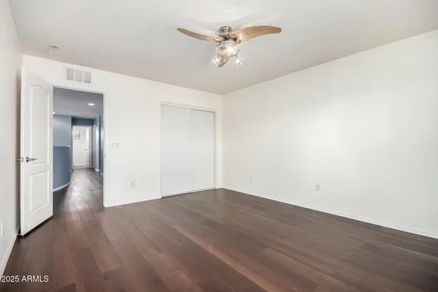 a view of an empty walk in closet