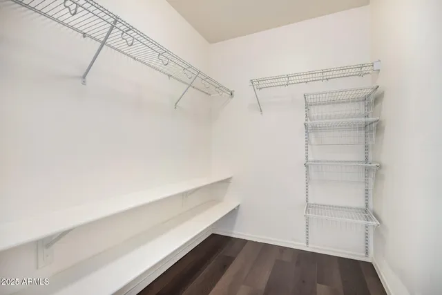 a bathroom with a shower a toilet and a sink