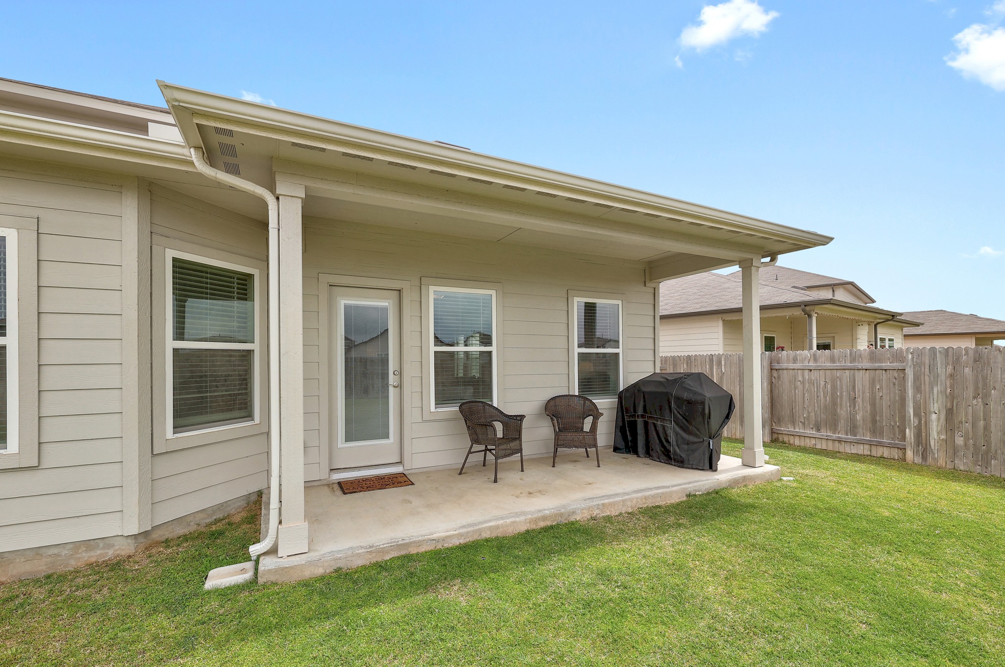 144 Sungrove Trail Georgetown, TX 78628 - Photo 24 of 40 A great sized covered patio in the backyard gives lots of opportunity for grilling and relaxing outdoors.