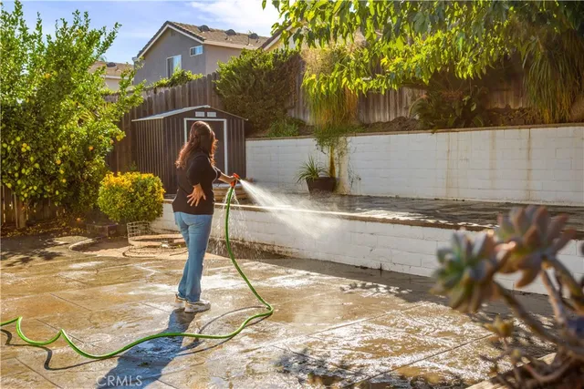 a view of a house with a tree