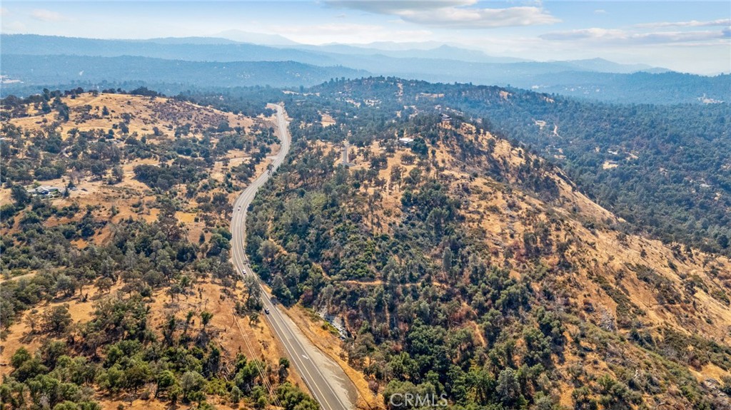 0 Toyon Mariposa, CA 95338 - Photo 2 of 5 an aerial view of house with yard and mountain view in back