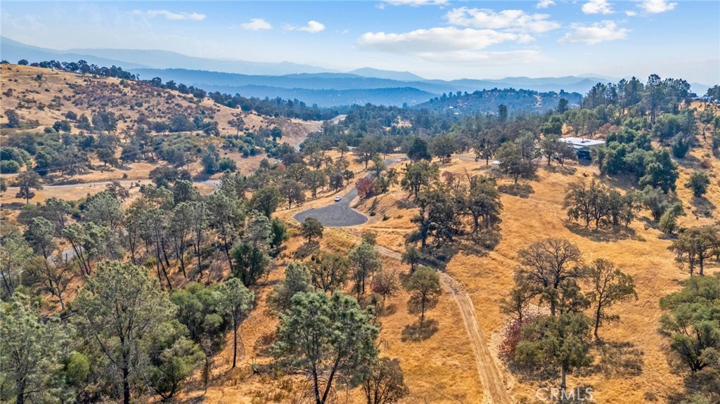 0 Toyon Mariposa, CA 95338 - Photo 4 of 5 an aerial view of residential houses with city and green space
