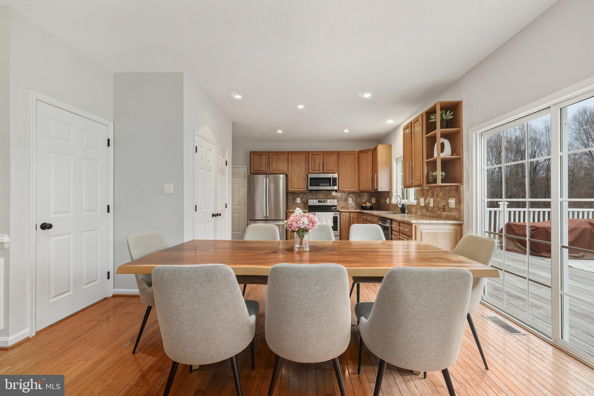 8439 Den Circle King George, VA 22485 - Photo 11 of 53 a view of a dining room with furniture window and wooden floor