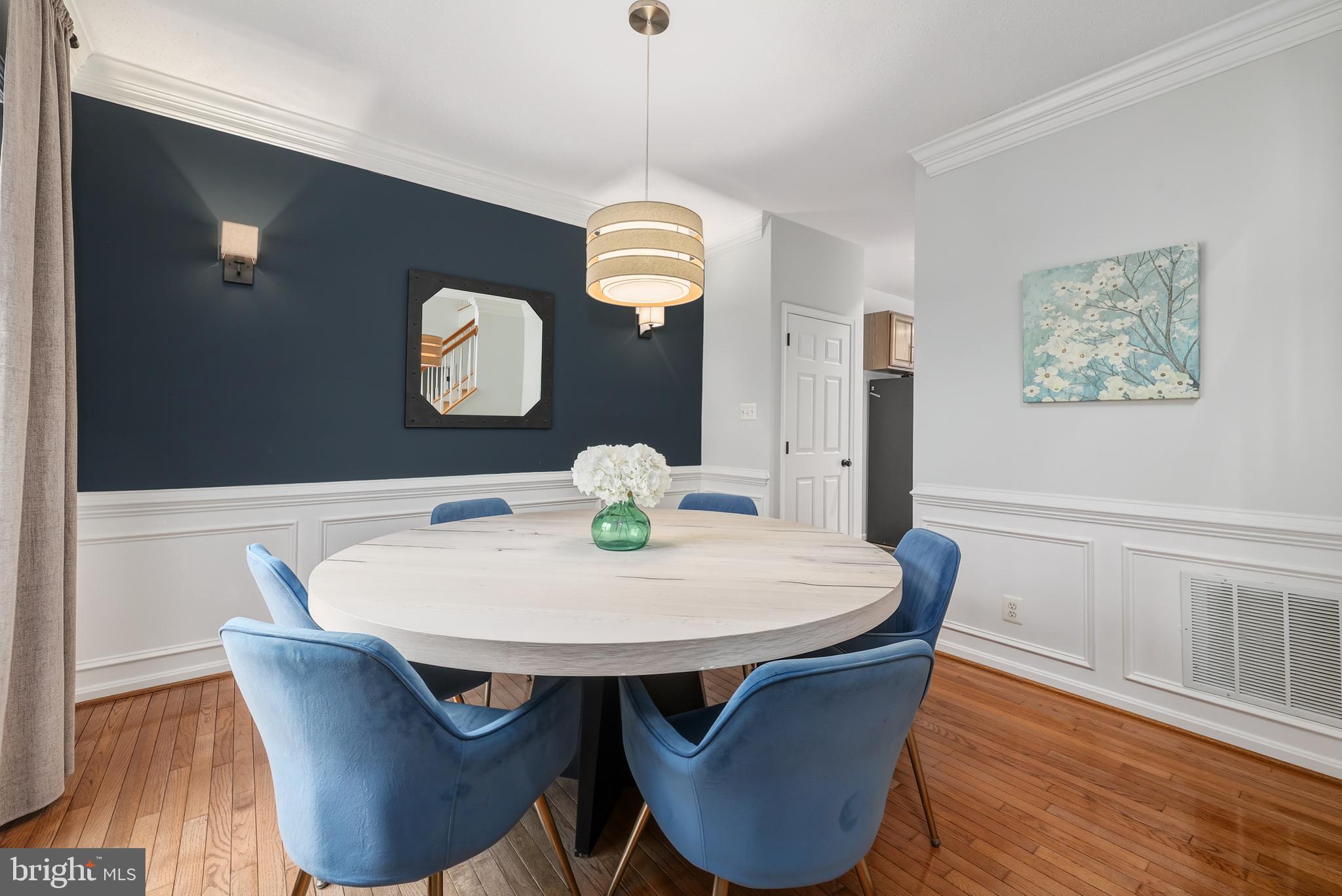 8439 Den Circle King George, VA 22485 - Photo 14 of 53 a dining room with furniture and wooden floor