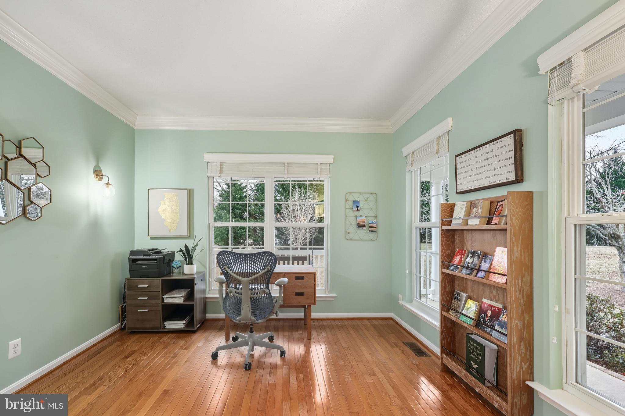 8439 Den Circle King George, VA 22485 - Photo 16 of 53 a view of a workspace with furniture and a window
