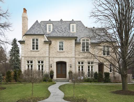 1030 Mohawk Road Wilmette, IL 60091 - Photo 1 of 1 a front view of a house with a yard