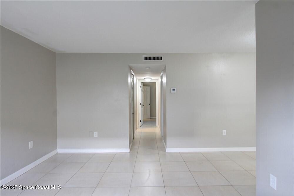 130 Roosevelt Avenue, Unit 104 Satellite Beach, FL 32937 - Photo 12 of 21 a view of an empty room