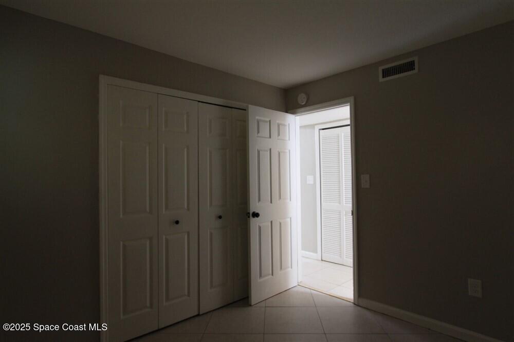 130 Roosevelt Avenue, Unit 104 Satellite Beach, FL 32937 - Photo 14 of 21 a view of an empty room