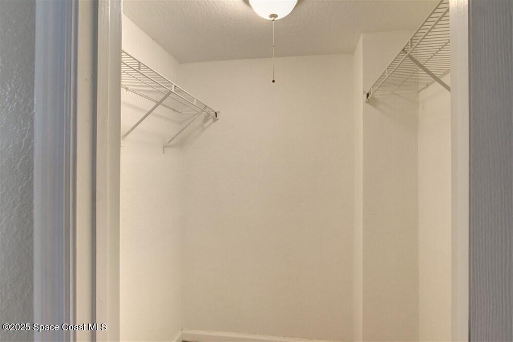 130 Roosevelt Avenue, Unit 104 Satellite Beach, FL 32937 - Photo 19 of 21 a view of walk in closet