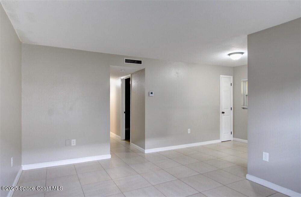 130 Roosevelt Avenue, Unit 104 Satellite Beach, FL 32937 - Photo 8 of 21 a view of an empty room