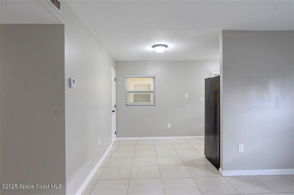 130 Roosevelt Avenue, Unit 104 Satellite Beach, FL 32937 - Photo 9 of 21 a view of an empty room