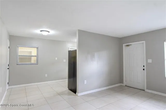 an empty room with a bathroom