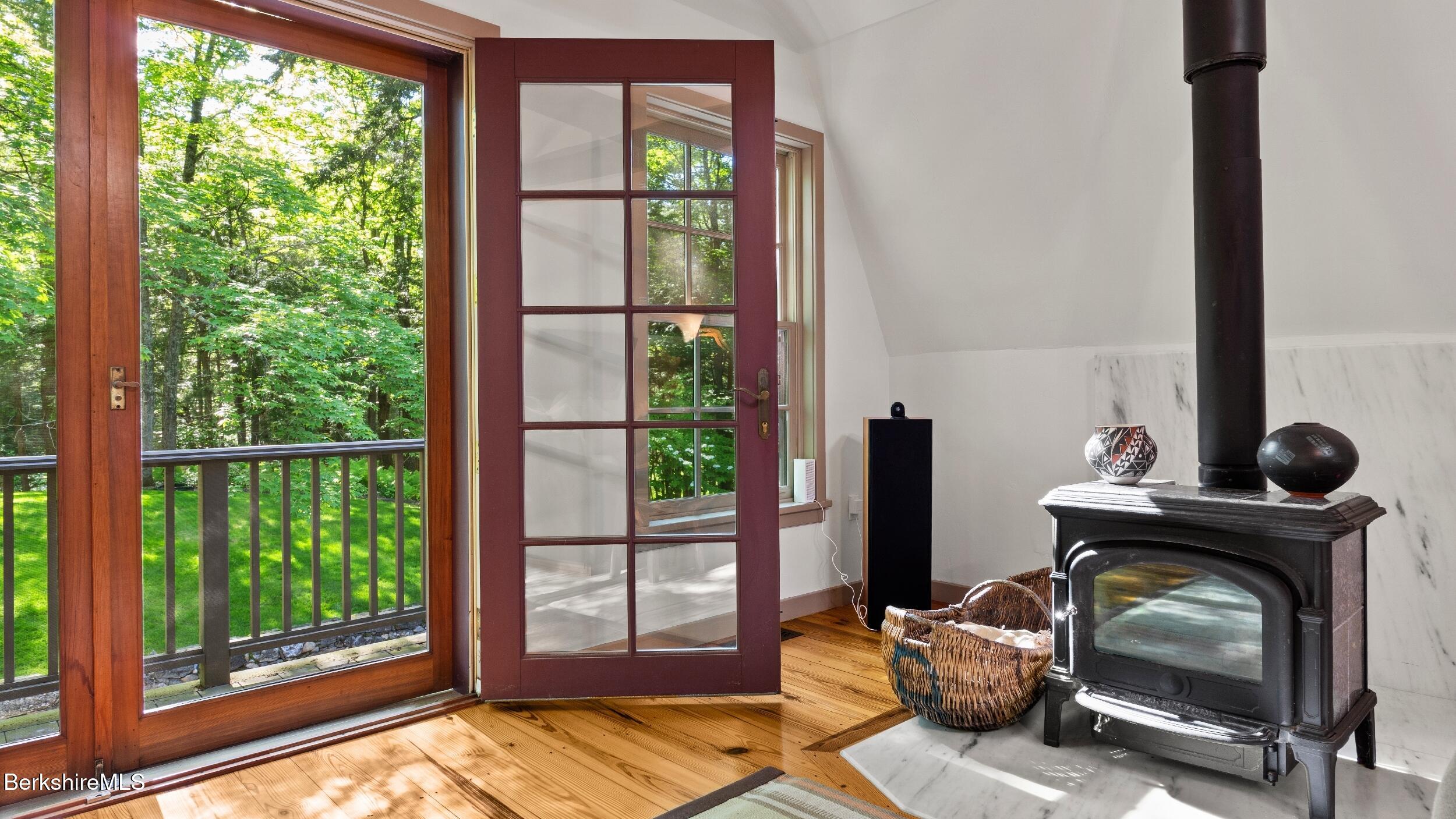 232 Giberson Road Sheffield, MA 01257 - Photo 32 of 53 a living room with furniture and a fireplace