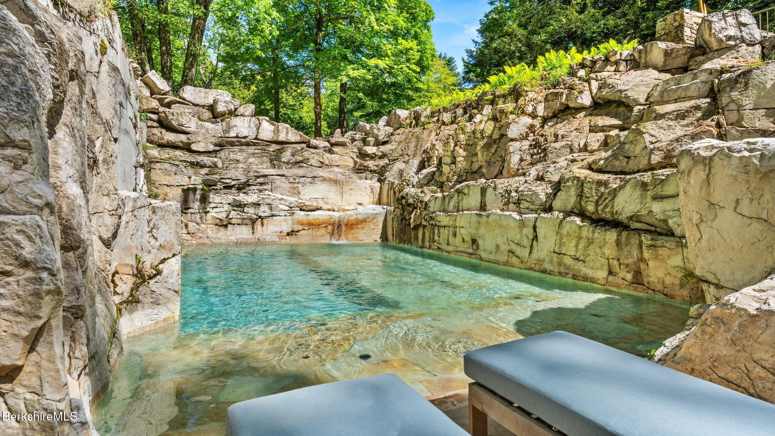 232 Giberson Road Sheffield, MA 01257 - Photo 52 of 53 a backyard of a house with yard and outdoor seating