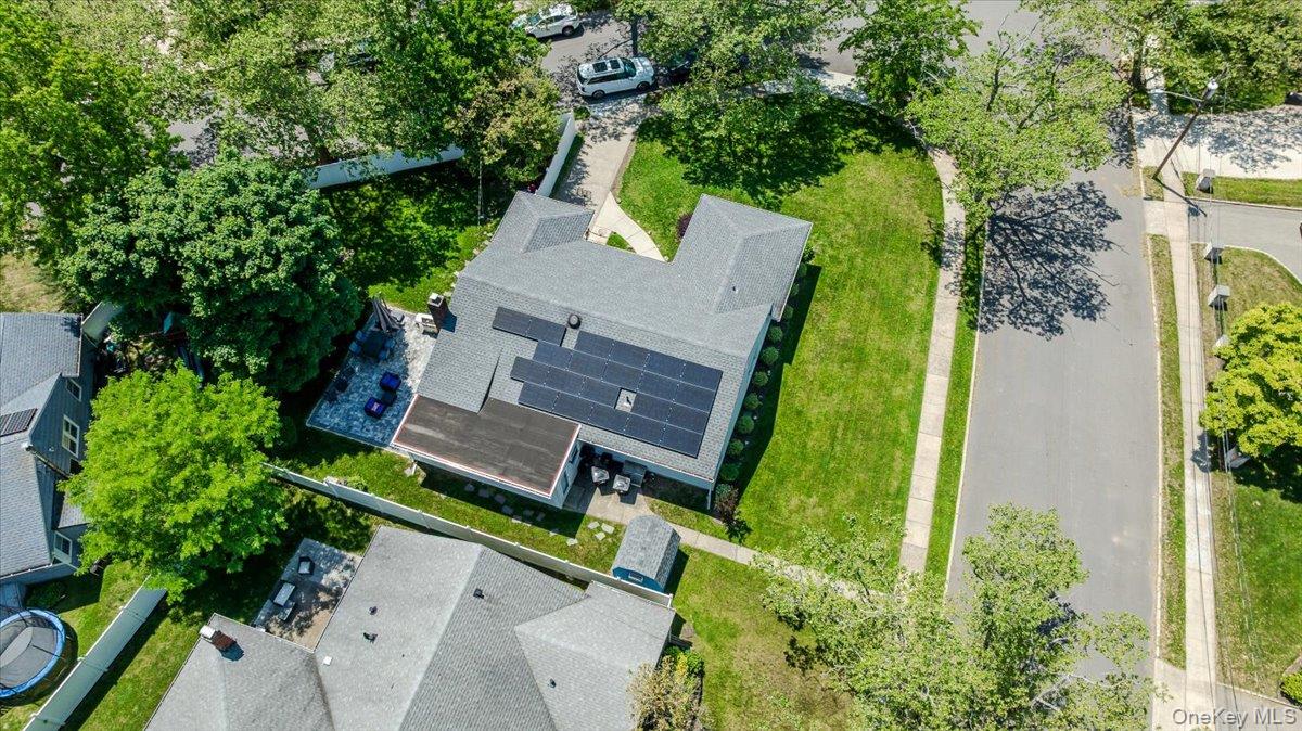 534 Allen Road Woodmere, NY 11598 - Photo 31 of 35 an aerial view of a house with a yard basket ball court and outdoor seating