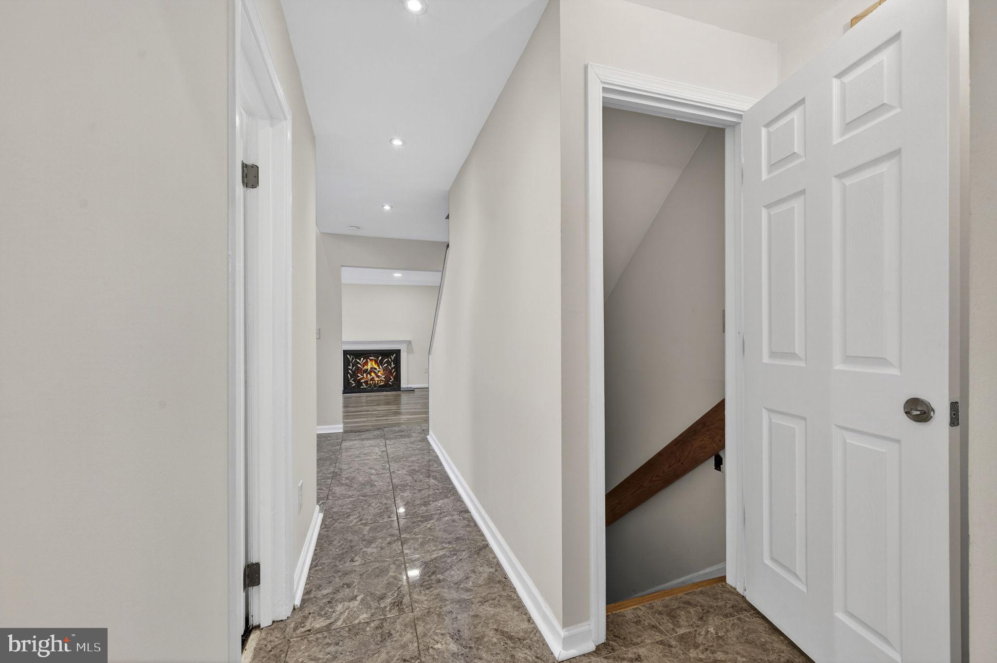 10600 Vantage Court Potomac, MD 20854 - Photo 47 of 91 a view of a hallway with wooden floor and a bathroom