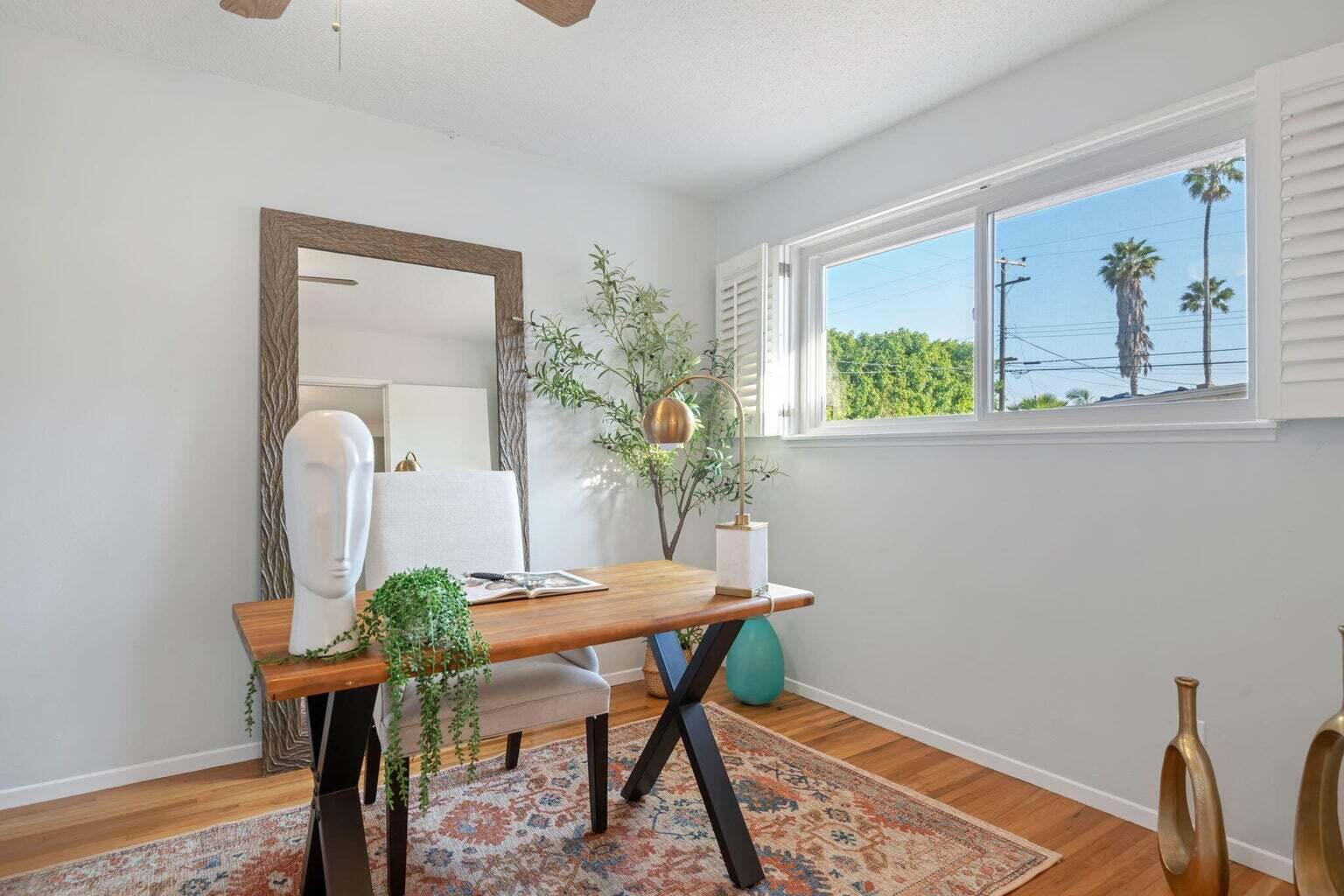 52 Deerhurst Drive Santa Barbara, CA 93117 - Photo 11 of 13 a view of a workspace with furniture and a potted plant